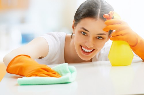 Local office cleaning team handling floors and touchpoints in W12