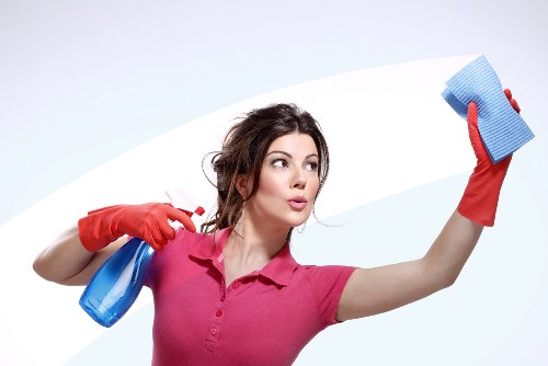 Routine domestic cleaning tasks in a W12 kitchen and bathroom